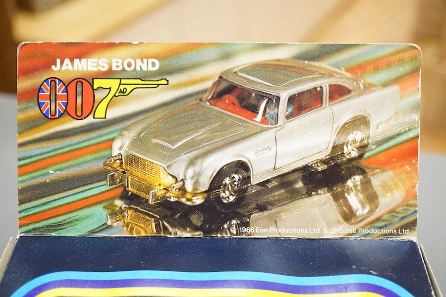 Two boxed 1970s Corgi Toys; a James Bond Aston Martin (261) in silver with passenger, together with a Jaguar XJS (319) in metallic red